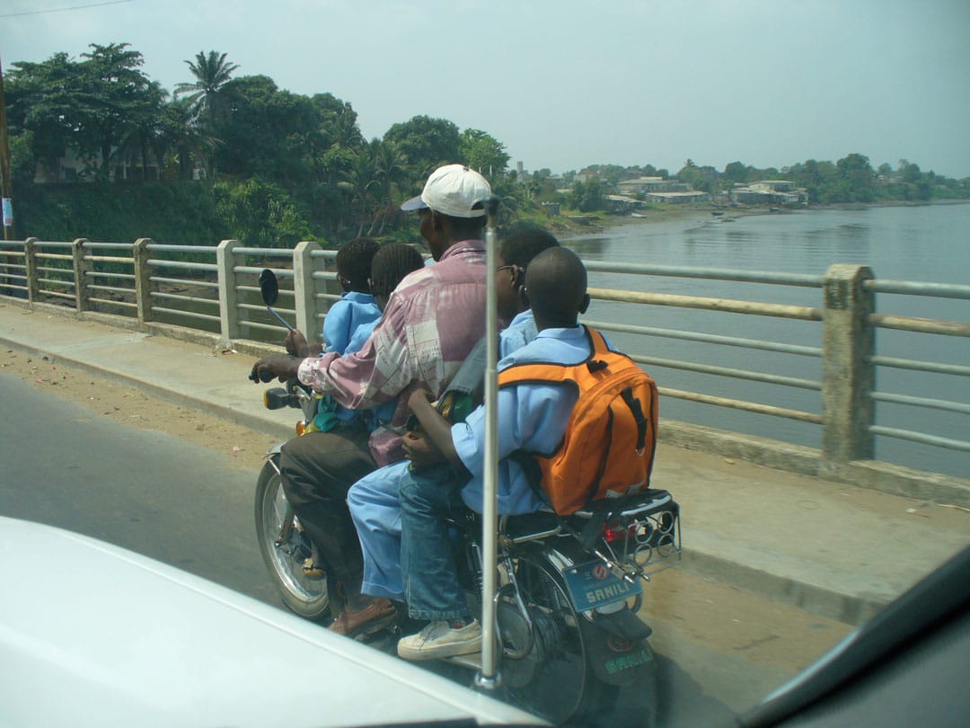 Father and 4 kids on motorcycle