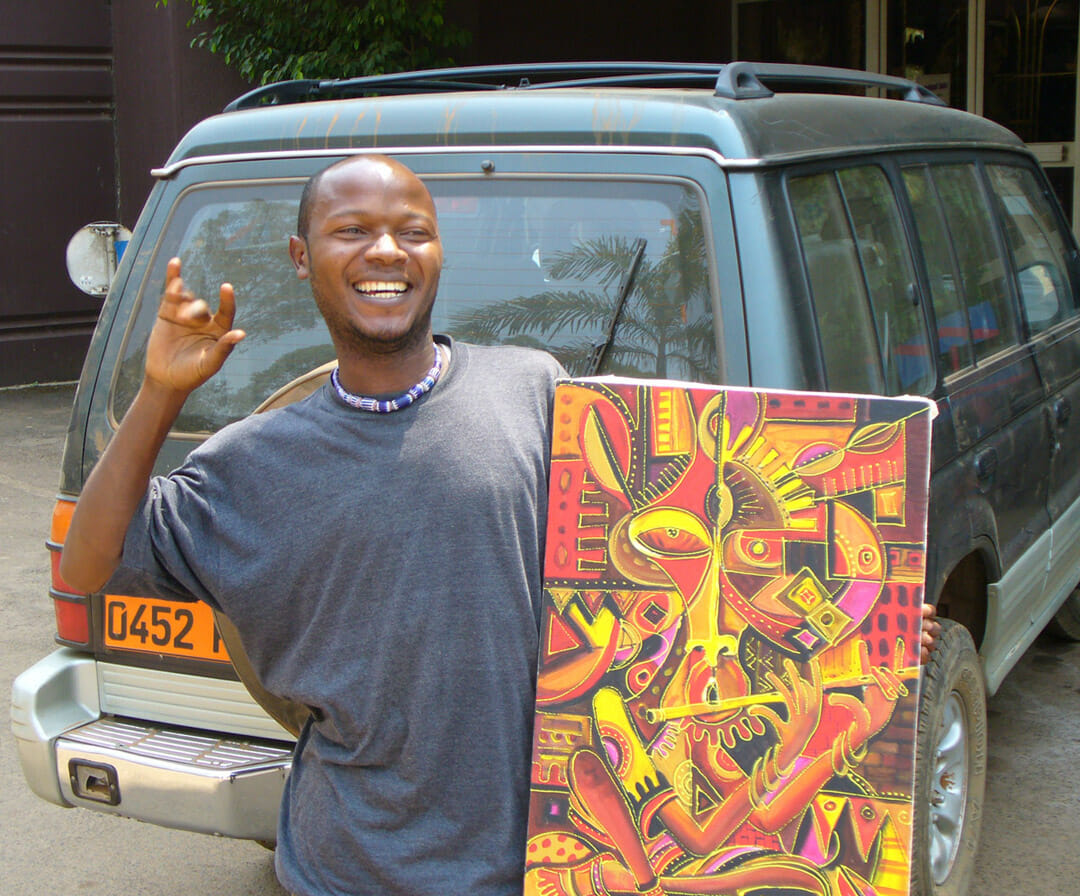 Cameroon artist Angu Walters with Flutist 1 painting